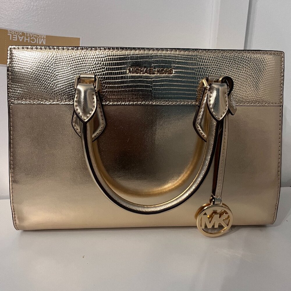 Gold Michael Kors Hand bag Retail $  $598